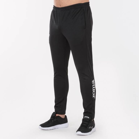 Spodnie treningowe JOMA VULCAN – obcisłe, kieszenie, suwaki, regulowany pas, barwy klubowe