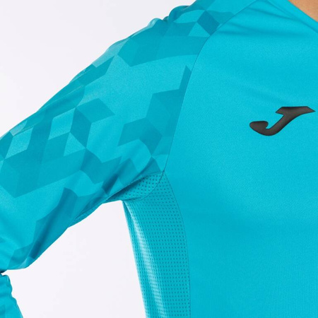 Zestaw bramkarski Joma Zamora VII 102789.010 SET - trzyczęściowy komplet w turkusowym kolorze, koszulka z długim rękawem i geometrycznym wzorem, elastyczne szorty, profesjonalne getry