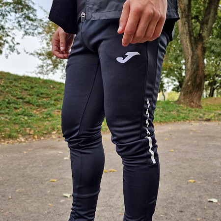 Spodnie Joma Eco Supernova 103194.100 czarne spodnie dresowe na co dzień jak i do treningu zapewniające optymalne dopasowanie