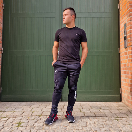 Spodnie Joma Combi Gold 100761.100 czarne spodnie dresowe na co dzień jak i do treningu zapewniające optymalne dopasowanie