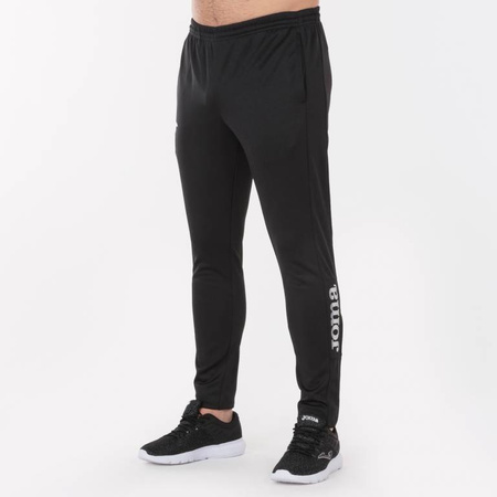 Spodnie JOMA AKADEMIA PIŁKARSKA 11 czarne obcisłe z kieszeniami i suwakami, regulowany pas