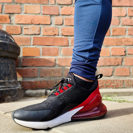 Spodnie Joma Champion VI 102057.332 granatowo-białe spodnie dresowe na co dzień jak i do treningu zapewniające optymalne dopasowanie