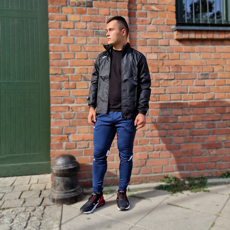 Spodnie Joma Champion VI 102057.332 granatowo-białe spodnie dresowe na co dzień jak i do treningu zapewniające optymalne dopasowanie