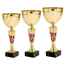 Zestaw pucharów BI BIE.SERIE34 H33 H31 H28 – złote trofea sportowe na podium