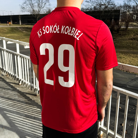 Zestaw meczowy SOKÓŁ KOŁBIEL – koszulki czerwona i niebieska, spodenki, getry, personalizowany numer